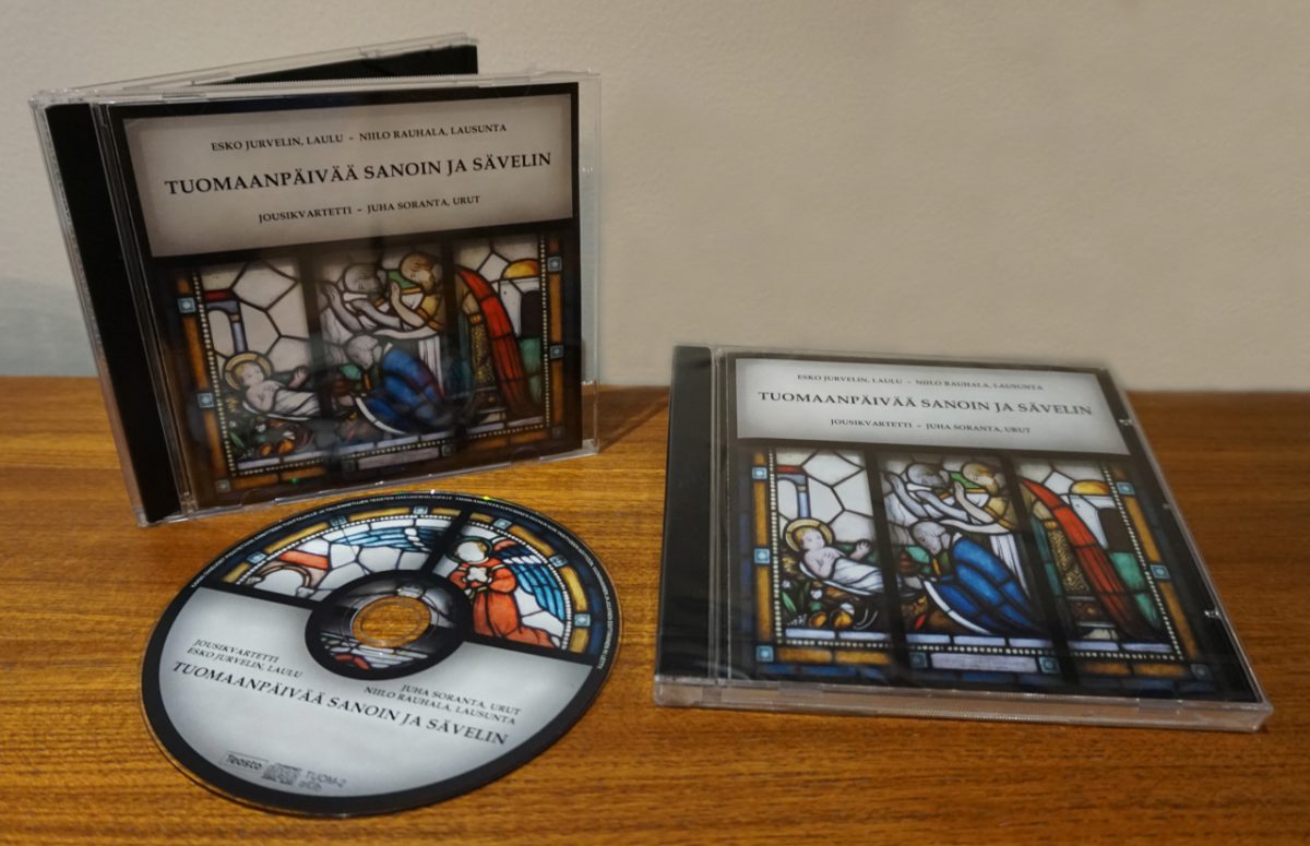 Tuomaanpäivää sanoin ja sävelin kannet ja cd